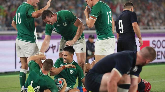 YOKOHAMA, JAPAN - SEPTEMBER 22: Andrew Conway of Ireland celebrates scoring his side's fourth try with his team mates during the Rugby World Cup 2019 Group A game between Ireland and Scotland at International Stadium Yokohama on September 22, 2019 in Yokohama, Kanagawa, Japan. (Photo by Stu Forster/Getty Images)