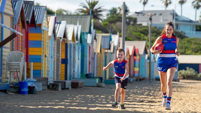 Irish Western Bulldogs player Katy Herron with her son Joshua. Picture: Jay Town