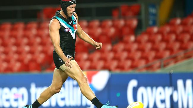 Brad Ebert kicks a goal for Port Adelaide. Picture: Jono Searle/AFL Photos/Getty Images.