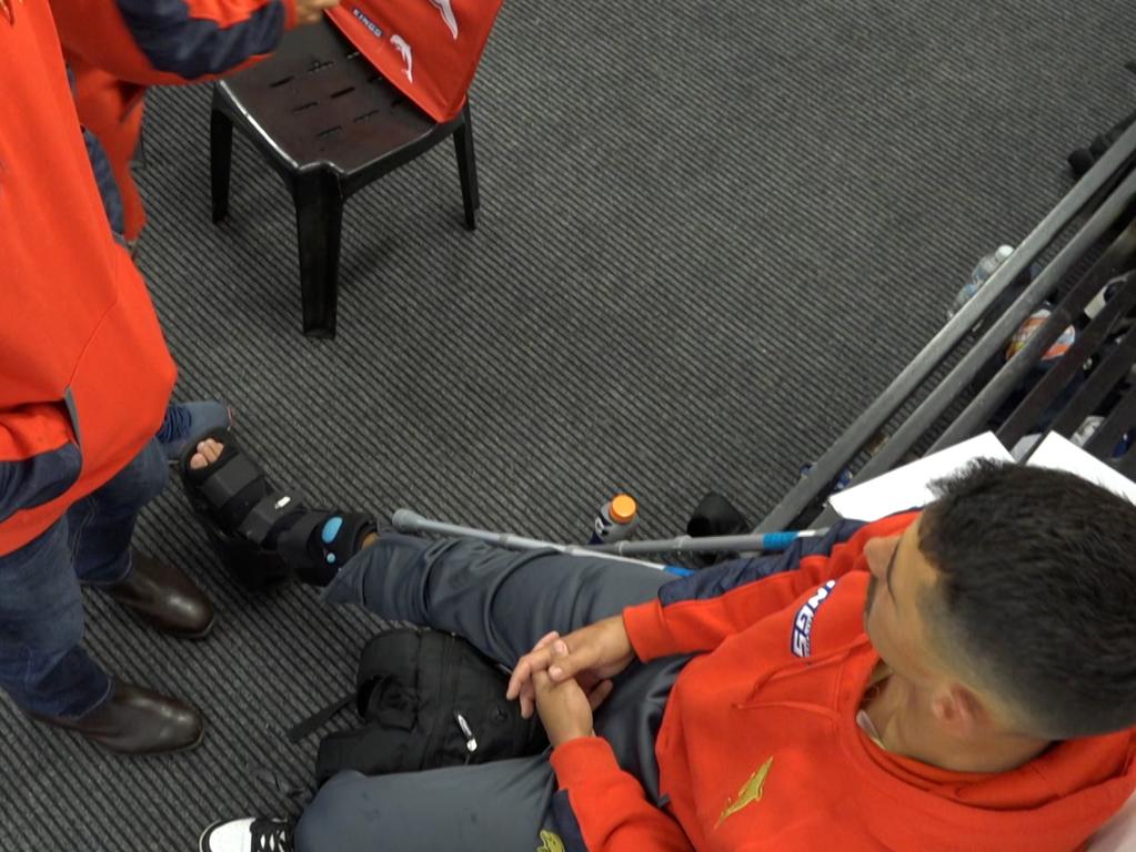 Dolphins star Jeremy Marshall-King in a moon boot after suffering an ankle injury.