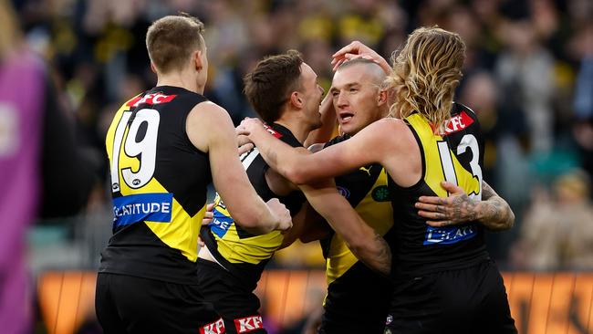 Martin was mobbed by his teammates after the goal. (Photo by Michael Willson/AFL Photos via Getty Images)