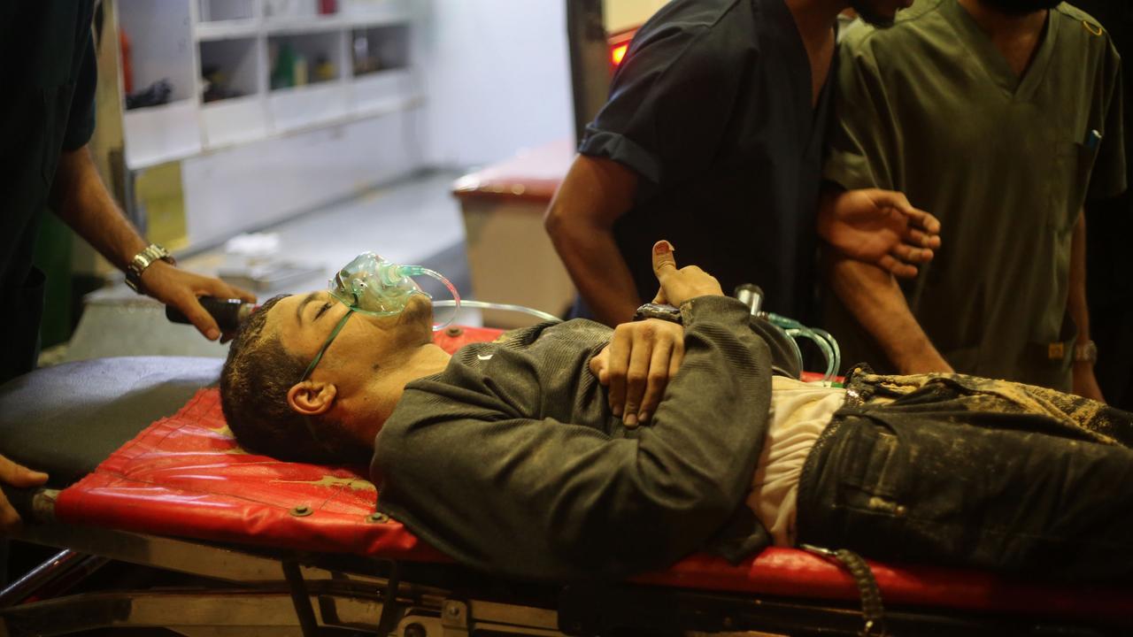 Palestinians injured during Israeli raids arrive at Nasser Hospital south of the Gaza Strip. Picture: Getty