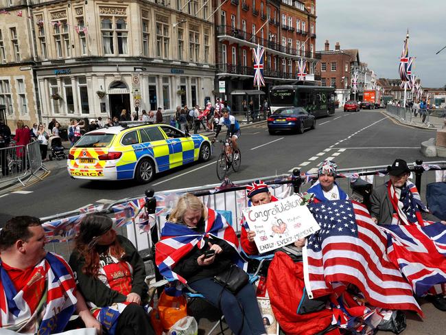 Royal fans have secured their viewing spots for the carriage procession. Picture: AFP