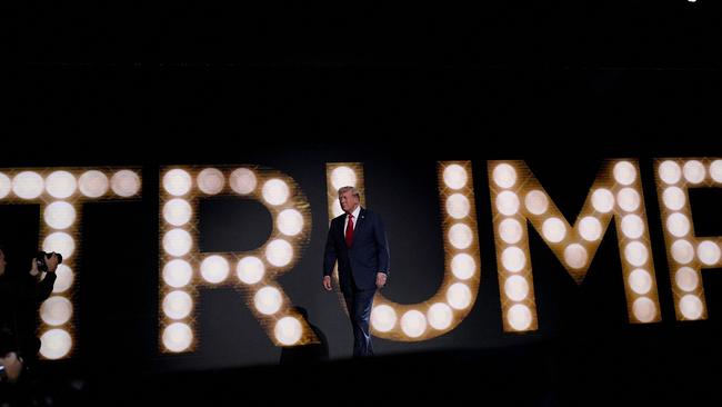 Donald Trump arrives to speak on stage on the fourth day of the Republican National Convention.