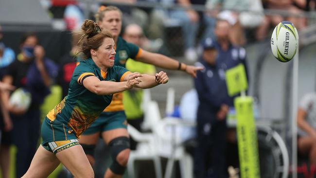 Australia's Lori Cramer makes a pass during the New Zealand 2021 Women's Rugby World Cup Pool match.