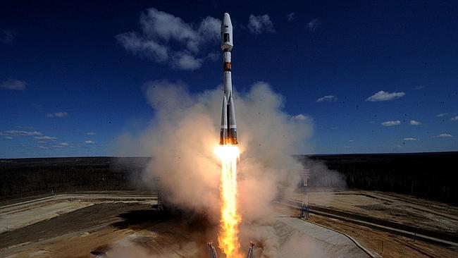 A Russian Soyuz 2.1a rocket carrying satellites lifts off from the launch pad at Vostochny.