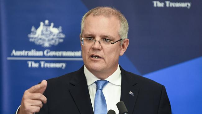 Australian Federal Treasurer Scott Morrison speaks during a press conference as he hands down the Mid-Year Economic and Fiscal Outlook 2017/18 at Parliament House in Canberra, Monday, December 18, 2017. (AAP Image/Lukas Coch) NO ARCHIVING