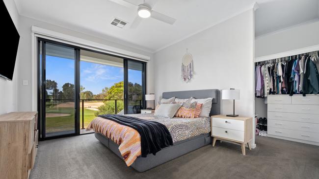 The bedroom overlooking the West Lakes Golf Club. Supplied