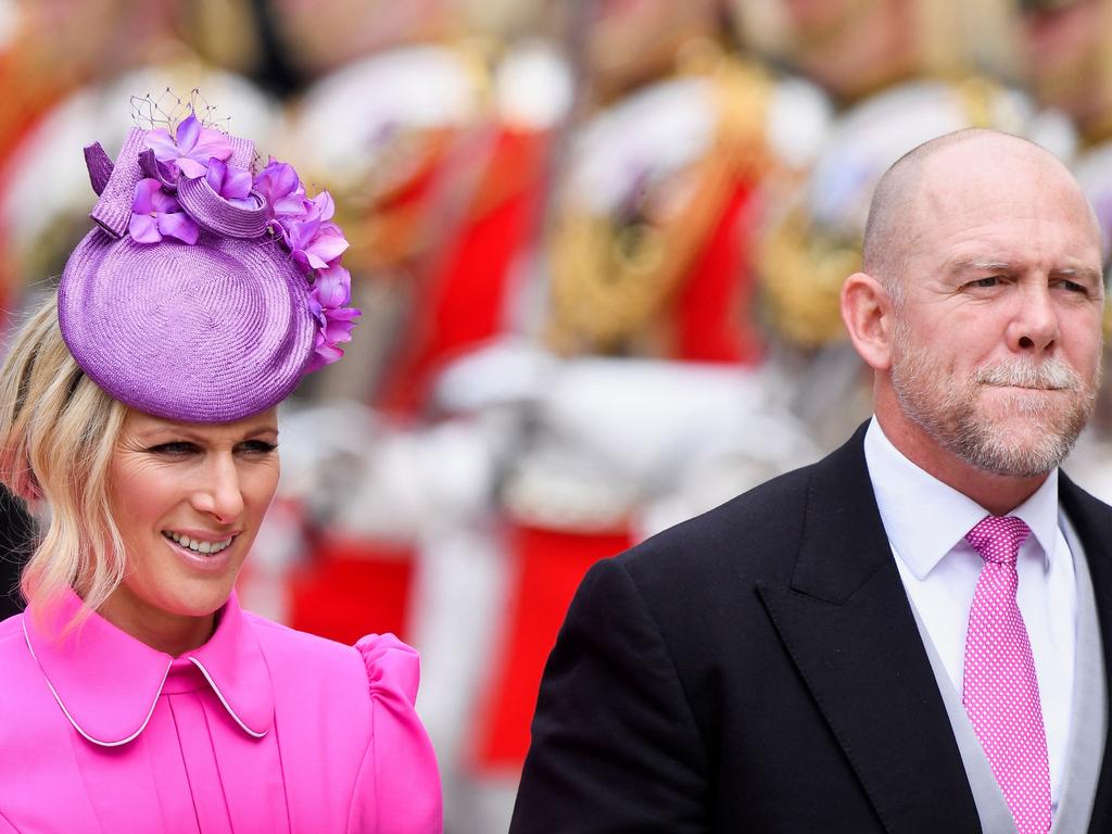 Zara Tindall in bright pink and her husband Mike Tindall. Picture: Getty Images