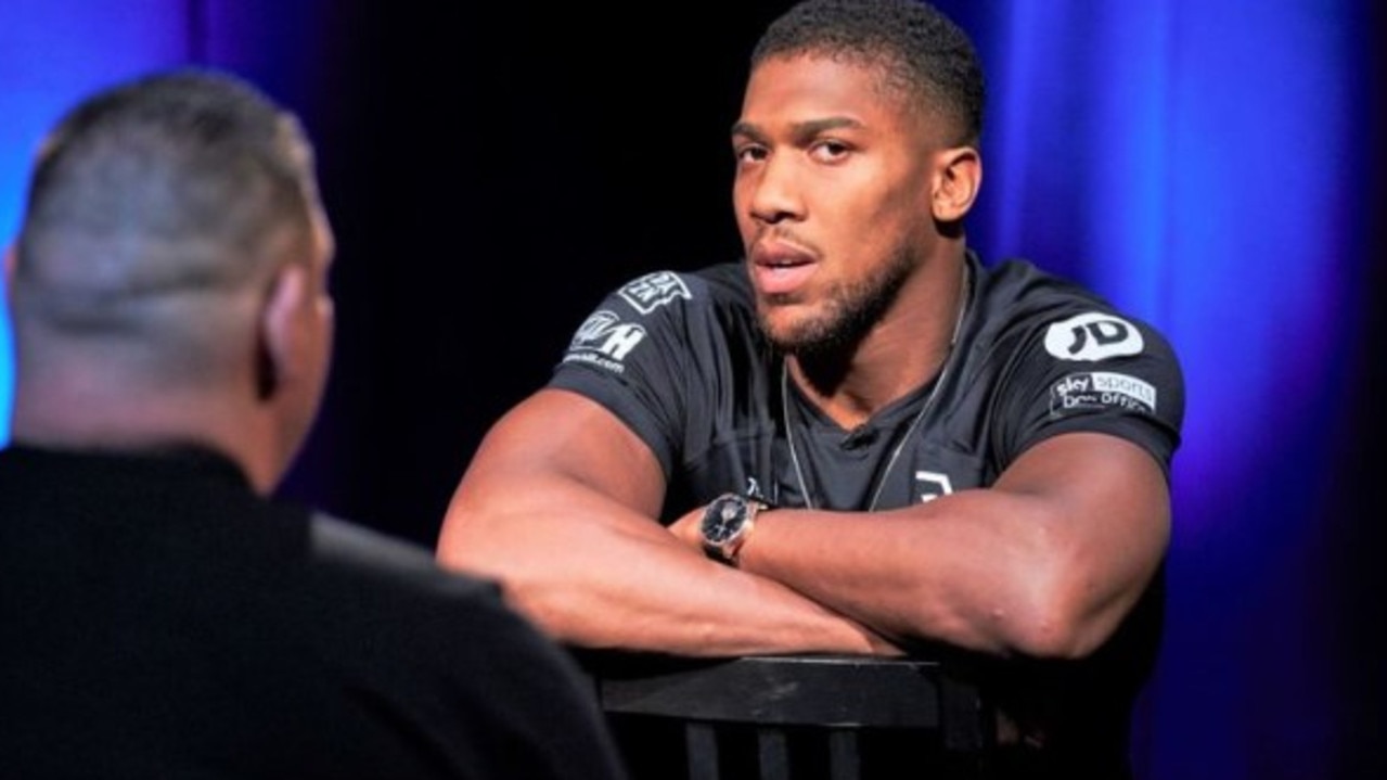 Anthony Joshua and Andy Ruiz Jr. sit across from each other on Sky Sports' 'Gloves Are Off'.