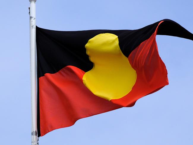 MELBOURNE, AUSTRALIA - NewsWire Photos JANUARY, 15, 2023: Th Aboriginal flag is seen at the Victorian Parliament building.Picture: NCA NewsWire / Luis Enrique Ascui