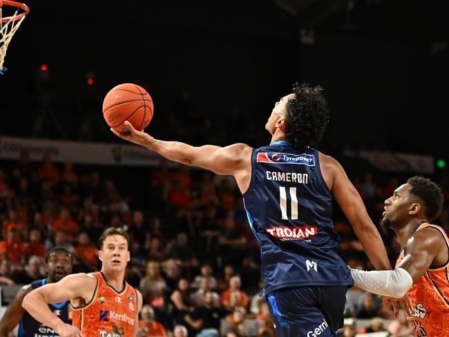 Flynn Cameron drives to the basket against Cairns. Picture: Getty