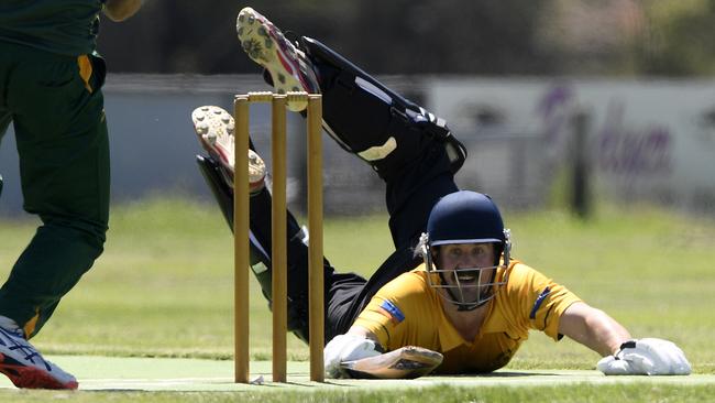 Ryan Billinghurst dives for the crease. Picture: Andy Brownbill