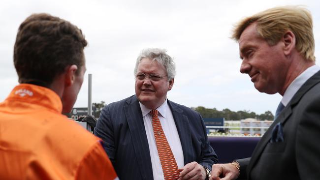 Racenet’s Ray Thomas (right) listens to the post-Gloaming conversation between jockey Josh Parr (left) and trainer Anthony Cummings. Picture: Jeremy Ng / Getty Images