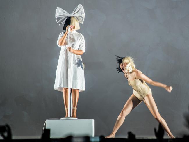 Sia and Maddie Ziegler on stage in Melbourne. Yes, it as them. Pic: Anthony Smith