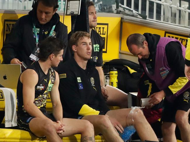 MELBOURNE, AUSTRALIA - MAY 21: Tom J. Lynch of the Tigers looks on from the bench after being subbed out of the game during the 2022 AFL Round 10 match between the Richmond Tigers and the Essendon Bombers at the Melbourne Cricket Ground on May 21, 2022 in Melbourne, Australia. (Photo by Dylan Burns/AFL Photos via Getty Images)