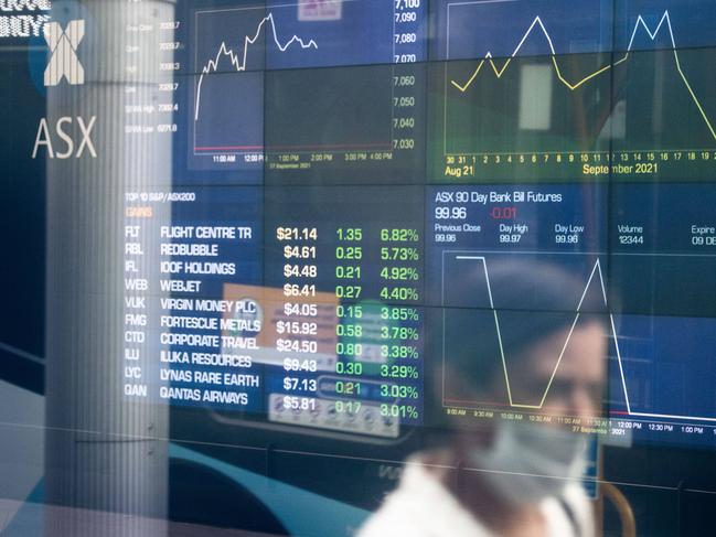 SYDNEY, AUSTRALIA - NewsWire Photos September 27, 2021: Information boards seen through the windows at the Australian Securities Exchange, Sydney. Picture: NCA NewsWire / James Gourley