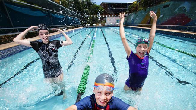 St Ita’s Catholic Primary School students Tess Mackinnon, 11, Riley Clarke, 10, and Isabella Byrne, 10. St Ita's school teaches its students to swim and to be safe around water. Picture: AAP Image/Claudia Baxter