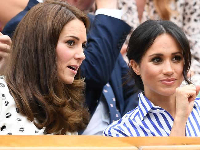 LONDON, ENGLAND - JULY 14:  Catherine, Duchess of Cambridge and Meghan, Duchess of Sussex attend day twelve of the Wimbledon Lawn Tennis Championships at All England Lawn Tennis and Croquet Club on July 14, 2018 in London, England.  (Photo by Clive Mason/Getty Images)