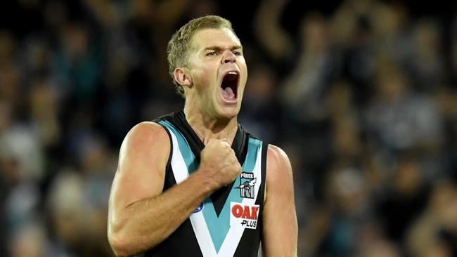 Dan Houston of Port Adelaide celebrates a goal against Richmond. Picture: AAP Image/Sam Wundke