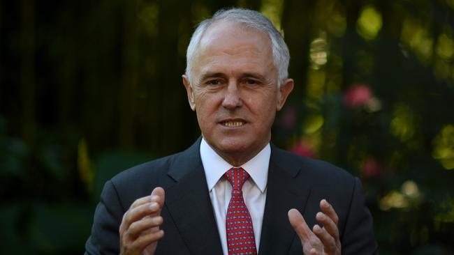 Malcolm Turnbull all but exited stage Potts Point yesterday, cutting out from a media scrum at Emu Plains in Sydney’s west. Picture: Lukas Coch