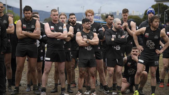 Dejected East Burwood players after losing the Division 4 final to Fairpark. Picture: Andy Brownbill