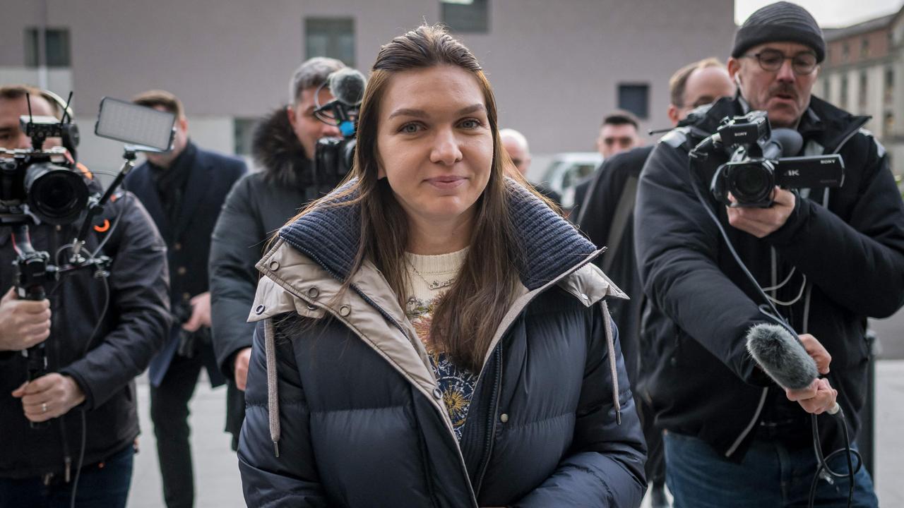 Former world number one tennis player Romania's Simona Halep arrives at the Court of Arbitration for Sport. Photo by Fabrice COFFRINI / AFP.