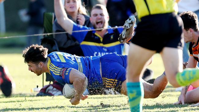 Ben Neville goes over for Toukley. Picture: Sue Graham