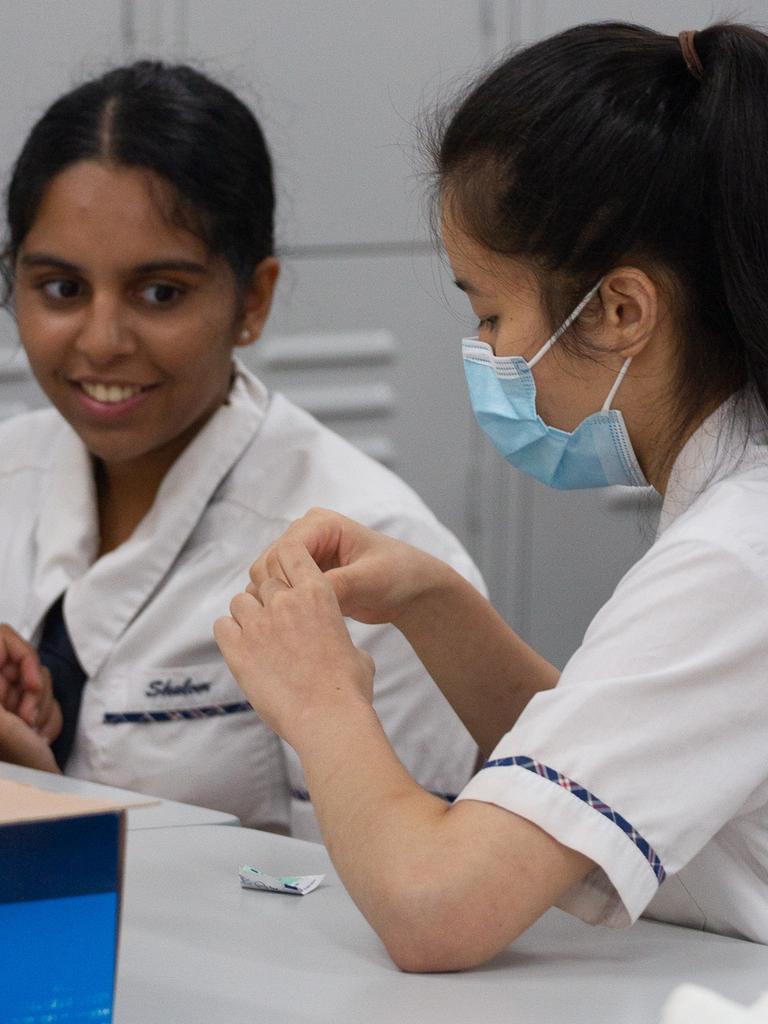 Some students were challenged by the task of pricking their own fingers.