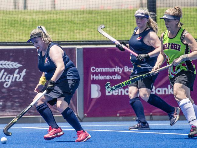 Action in the Pan Pacific Masters Games Hockey tournament. Picture: Glenn Campbell