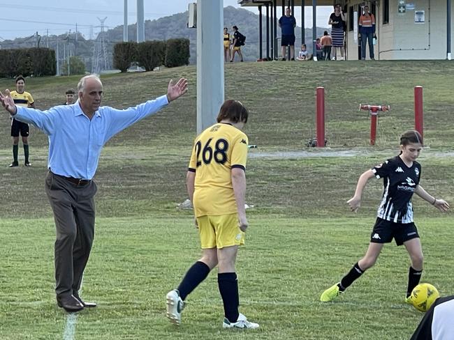 True to his background in coaching, Mr Dalton hopped onto the field for some drills. Photo: Fergus Gregg