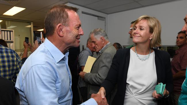 Federal Member for Warringah Tony Abbott shakes hands with Independent candidate for Warringah Zali Steggall. (AAP Image/Dean Lewins) 