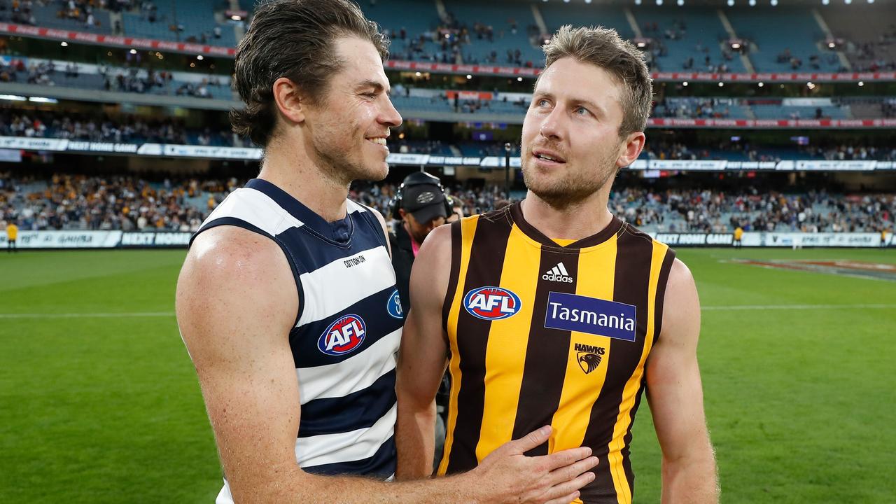 Isaac Smith and ex-teammate Liam Shiels after the match. Picture: AFL Photos/Getty Images