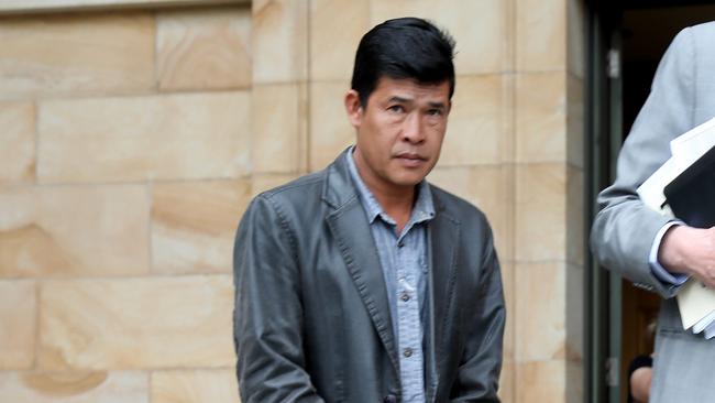 Seang Leng Heng leaving the Magistrates Court. Picture: Dean Martin