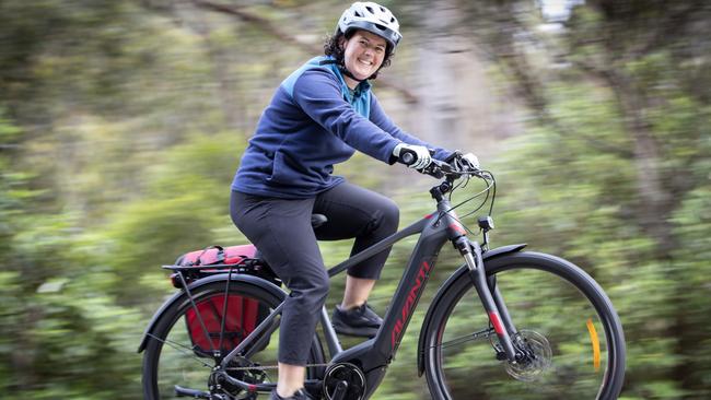 Caroline Lindus rides her e-bike at Fern Tree. Picture: Chris Kidd