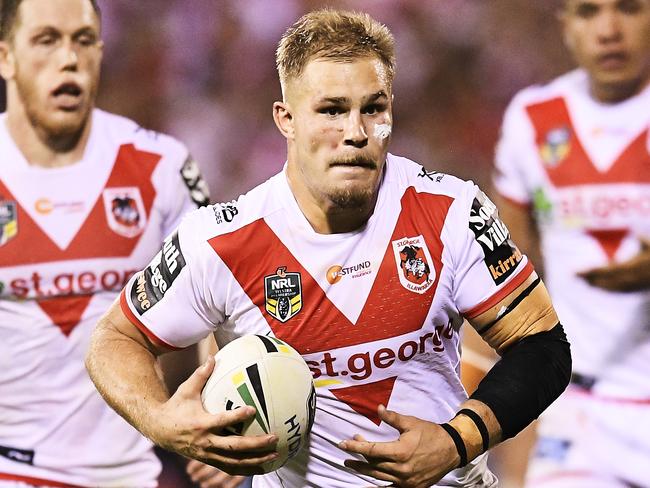 WOLLONGONG, AUSTRALIA - APRIL 13:  Jack De Belin of the Dragons runs the ball during the round six NRL match between the St George Illawarra Dragons and the Cronulla Sharks at WIN Stadium on April 13, 2018 in Wollongong, Australia.  (Photo by Brett Hemmings/Getty Images)