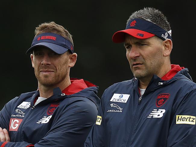 MELBOURNE, AUSTRALIA - DECEMBER 09: Demons assistant coach Adem Yze (R) speaks with Demons head coach Simon Goodwin during a Melbourne Demons AFL training session at Casey Fields on December 09, 2020 in Melbourne, Australia. (Photo by Daniel Pockett/Getty Images)