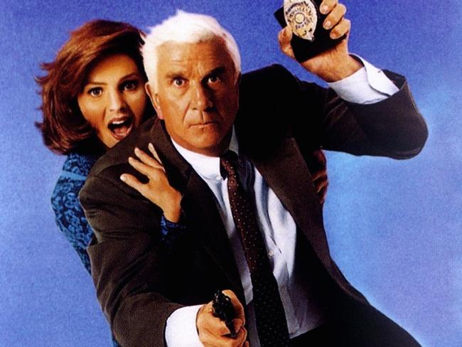 Actor Priscilla Presley and Leslie Nielsen in scene from film 'The Naked Gun 2 1/2: The Smell of Fear'.