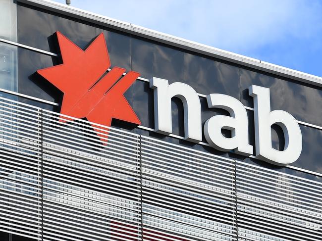 General view of NAB signage at the company's head office in Melbourne, Tuesday March 17, 2020. NAB employees have been evacuated from the head office following a staff member being confirmed as positive to coronavirus today. (AAP Image/James Ross) NO ARCHIVING