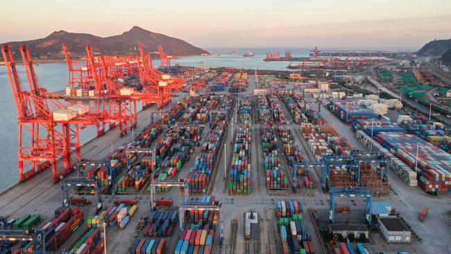 In August, China released a five-year plan calling for greater regulation of its economy. Above, containers stacked at Lianyungang port, in China's eastern Jiangsu province. There may be a shift in emphasis from goods to services. Picture: AFP