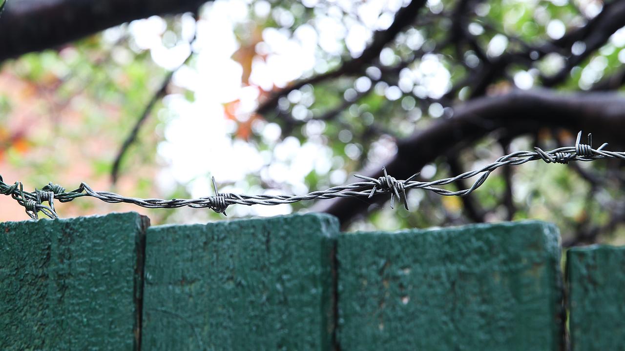 Barbed wire along the fence of Bruce Roberts house in Greendale Street, Greenwich.