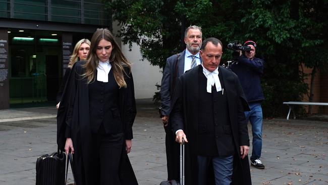 Erin Patterson’s legal team led by Colin Mandy SC (right, front) leave court. Picture: Luis Enrique Ascui
