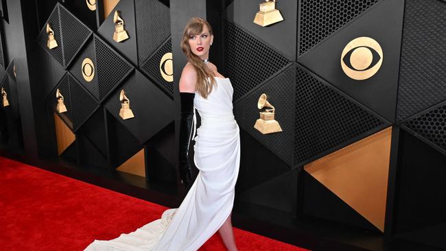 US singer-songwriter Taylor Swift arrives for the 66th Annual Grammy Awards in custom Schiaparelli. The pop star could make Grammys history tonight, should she take home her fourth win for Album of the Year. Picture: Robyn Beck/AFP