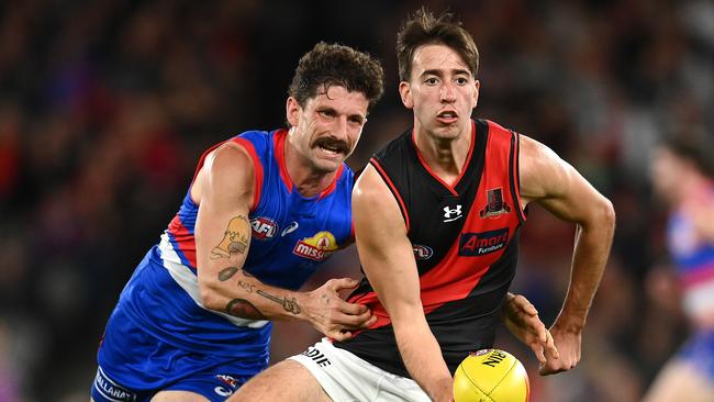 Tom Liberatore tackles Nic Martin.