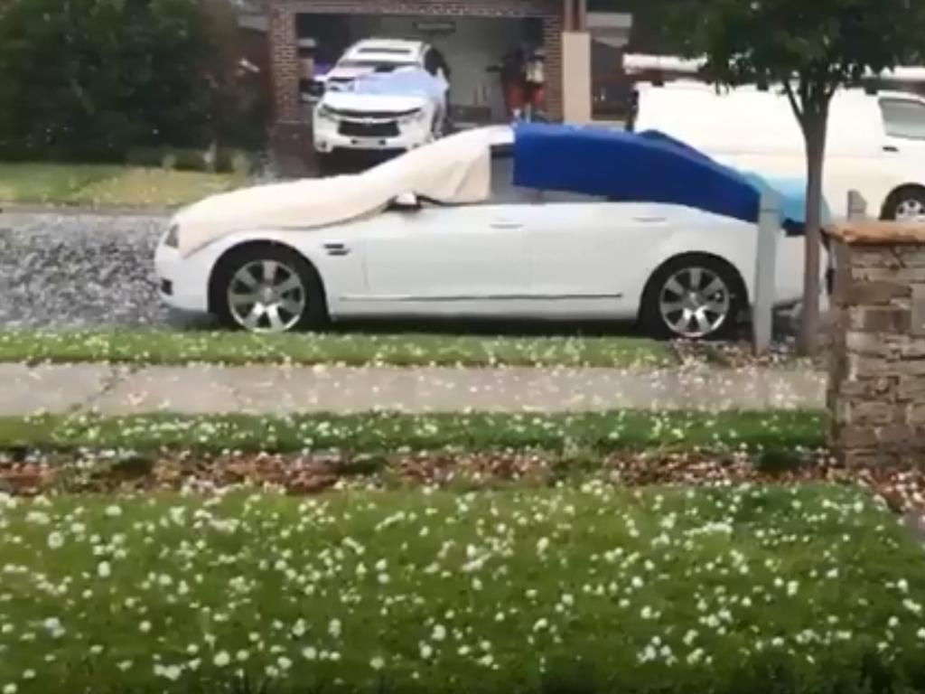 A car is pelted by hail at Oran Park. Picture: Twitter/Emma Smidt