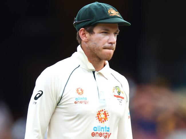 TOPSHOT - Australia's captain Tim Paine looks on between the overs on day five of the fourth cricket Test match between Australia and India at The Gabba in Brisbane on January 19, 2021. (Photo by Patrick HAMILTON / AFP) / --IMAGE RESTRICTED TO EDITORIAL USE - STRICTLY NO COMMERCIAL USE--