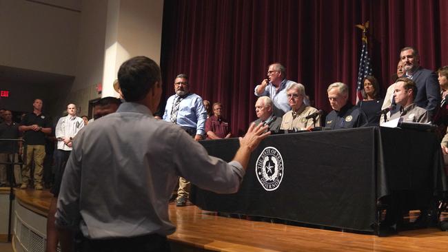 Beto O'Rourke interrupts Texas Governor Greg Abbott during a press conference at Uvalde High School. Picture: Allison Dinner/AFP