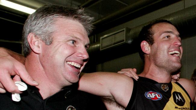 Danny Frawley and Brad Ottens celebrate a win in 2004. Picture: Kelly Barnes