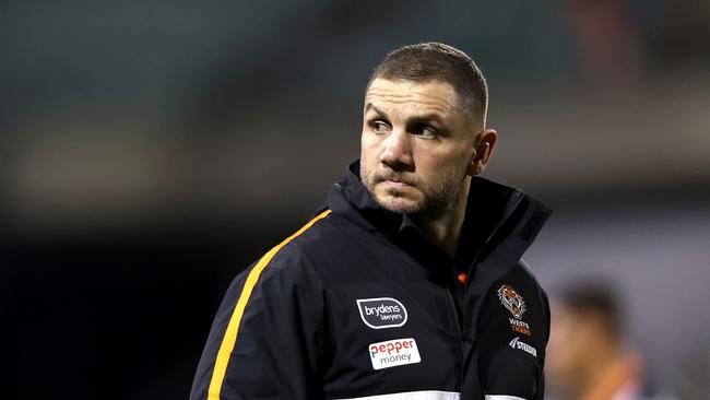 WOLLONGONG, AUSTRALIA - JULY 20: Assistant Coach of the Tigers Robbie Farah reacts after the round 21 NRL match between St George Illawarra Dragons and Wests Tigers at WIN Stadium on July 20, 2023 in Wollongong, Australia. (Photo by Jeremy Ng/Getty Images)