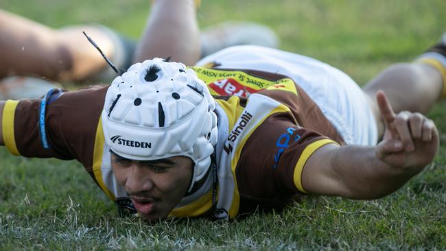 James Patolo scores a try for Cambridge Park in their 20-10 win over Brothers in round eight. Pics by Julian Andrews.
